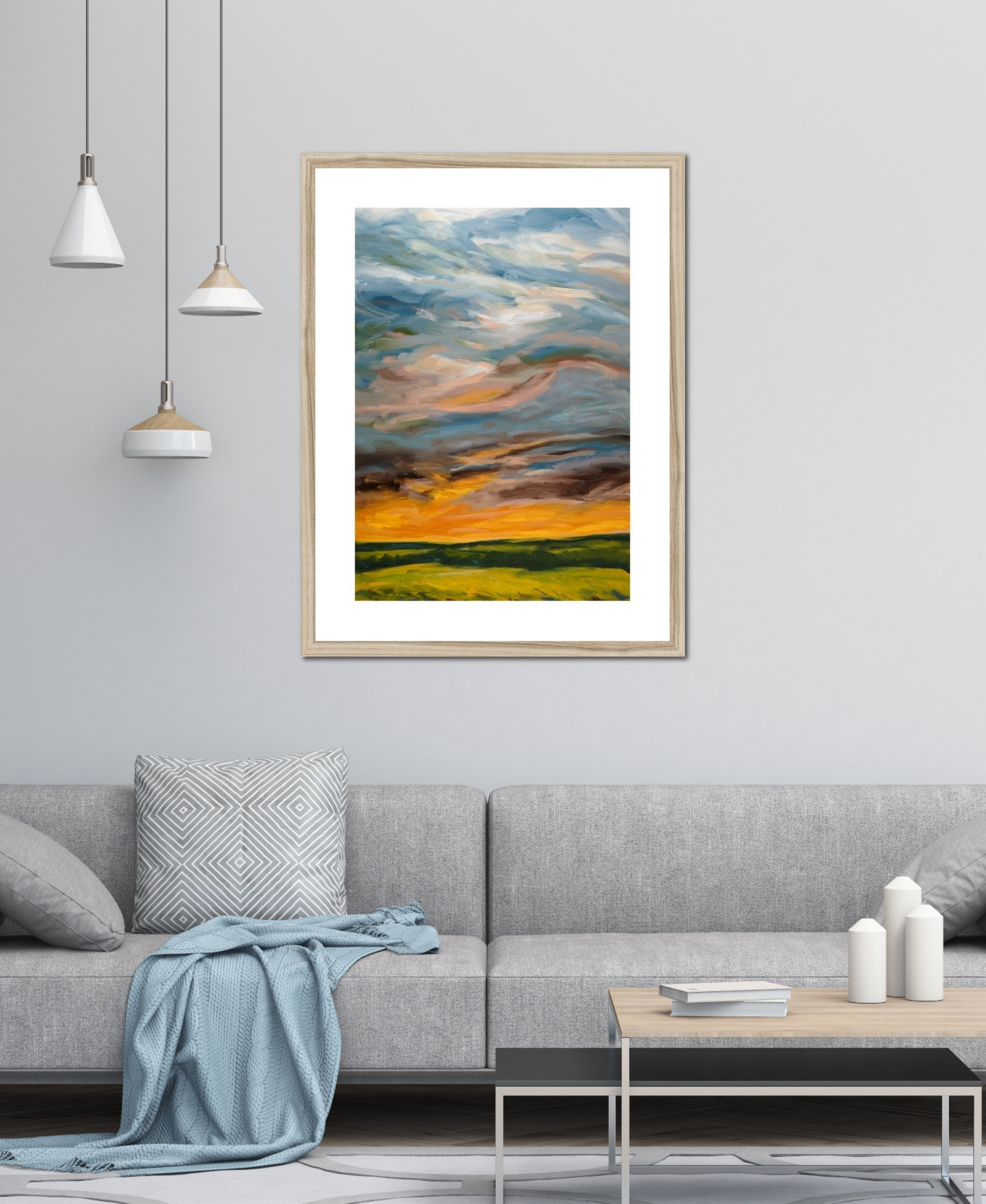 Framed abstract painting in a living room setting with a gray sofa and coffee table.