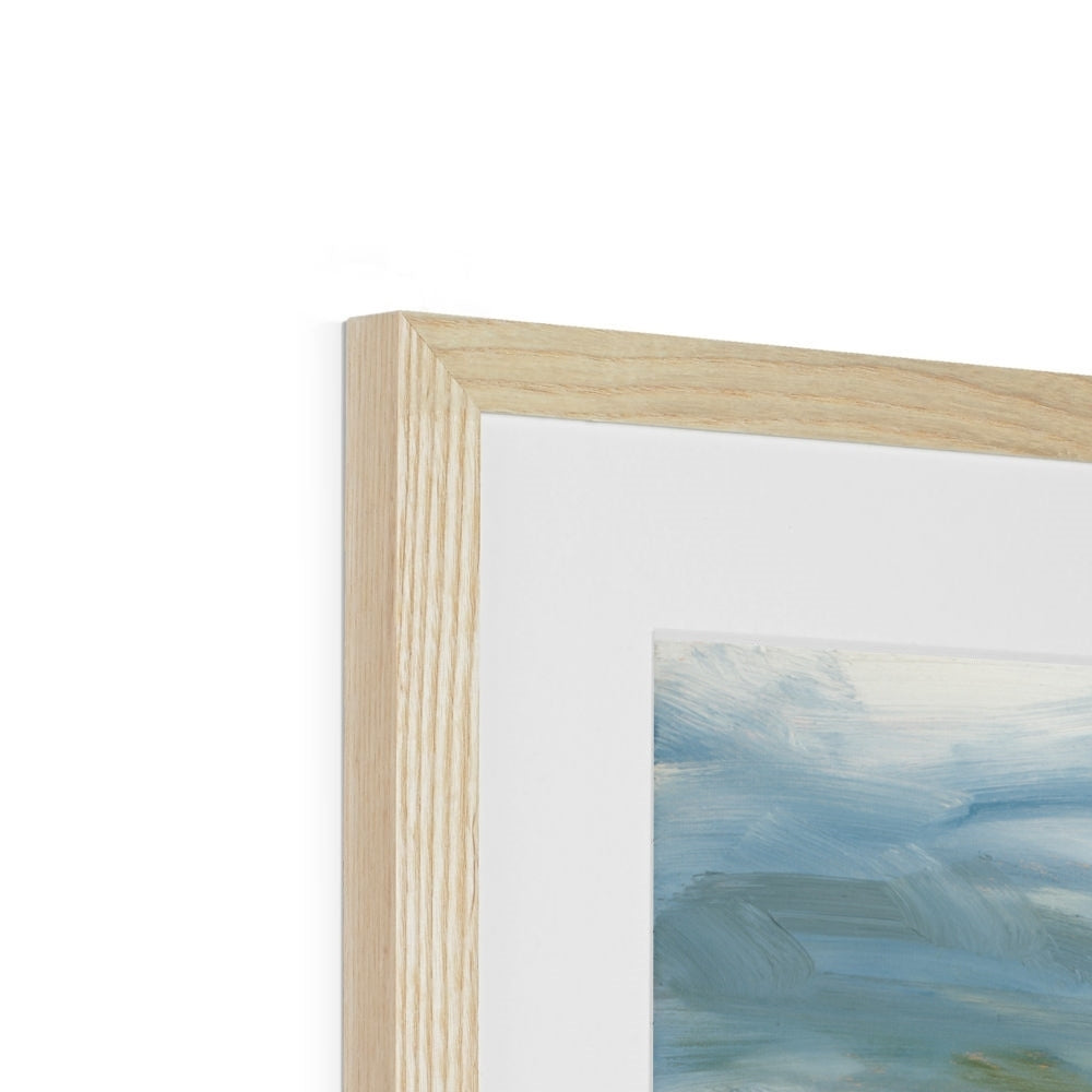 Close-up of a wooden picture frame with a blurred artwork inside on a white background