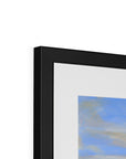 Framed abstract artwork with a black frame on a white background