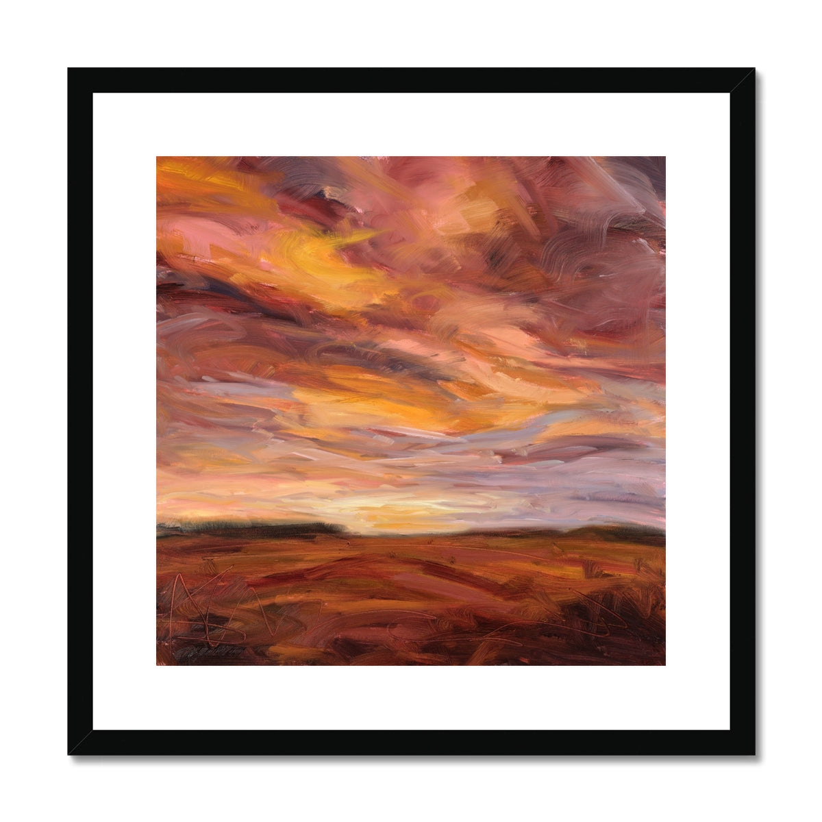Framed abstract painting of a sunset with warm colors.