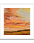 Framed abstract painting with warm colors on a white background