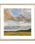 Framed painting of a landscape with a sky and field.