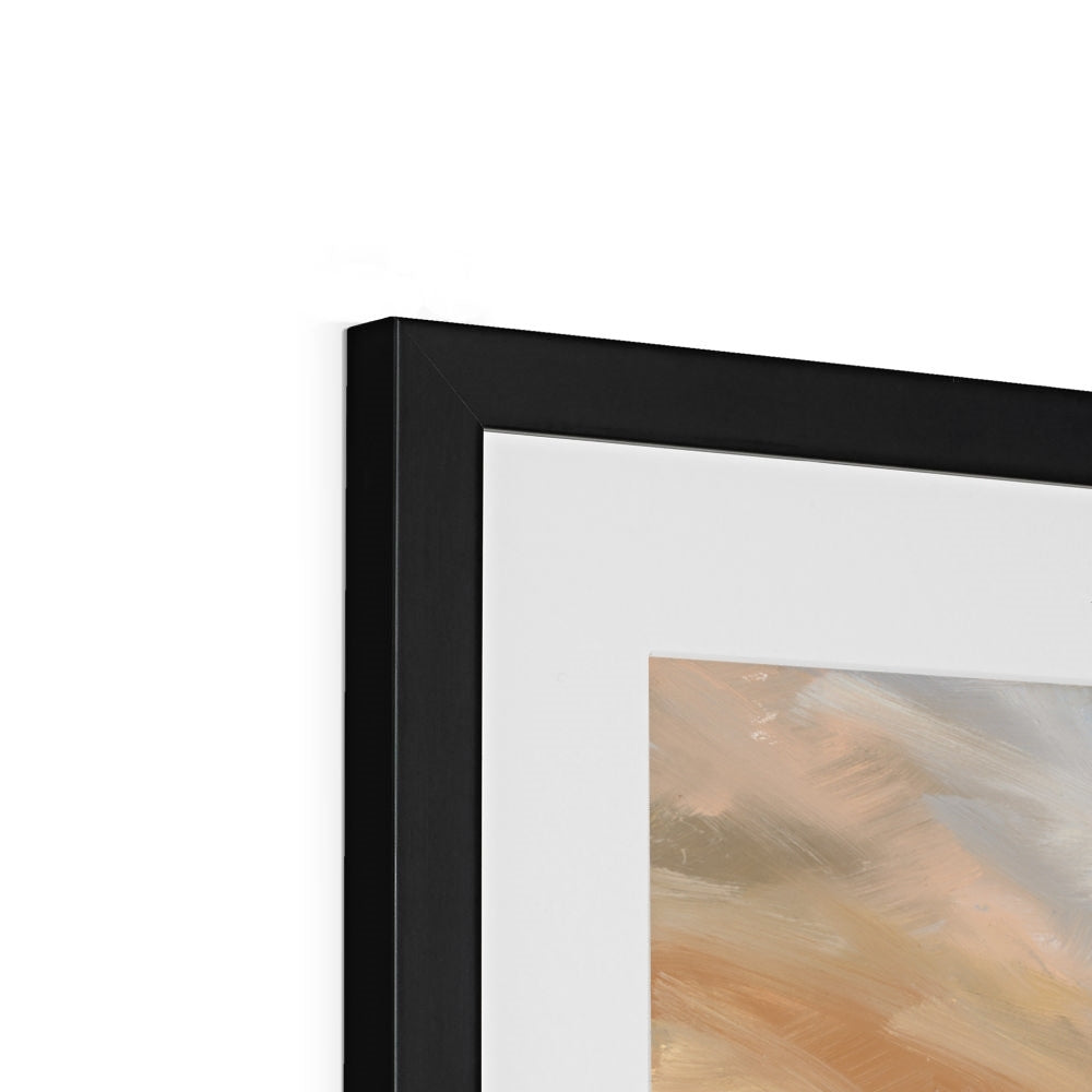 Close-up of a black framed artwork with a white mat on a white background