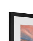 Framed abstract artwork with a black frame on a white background