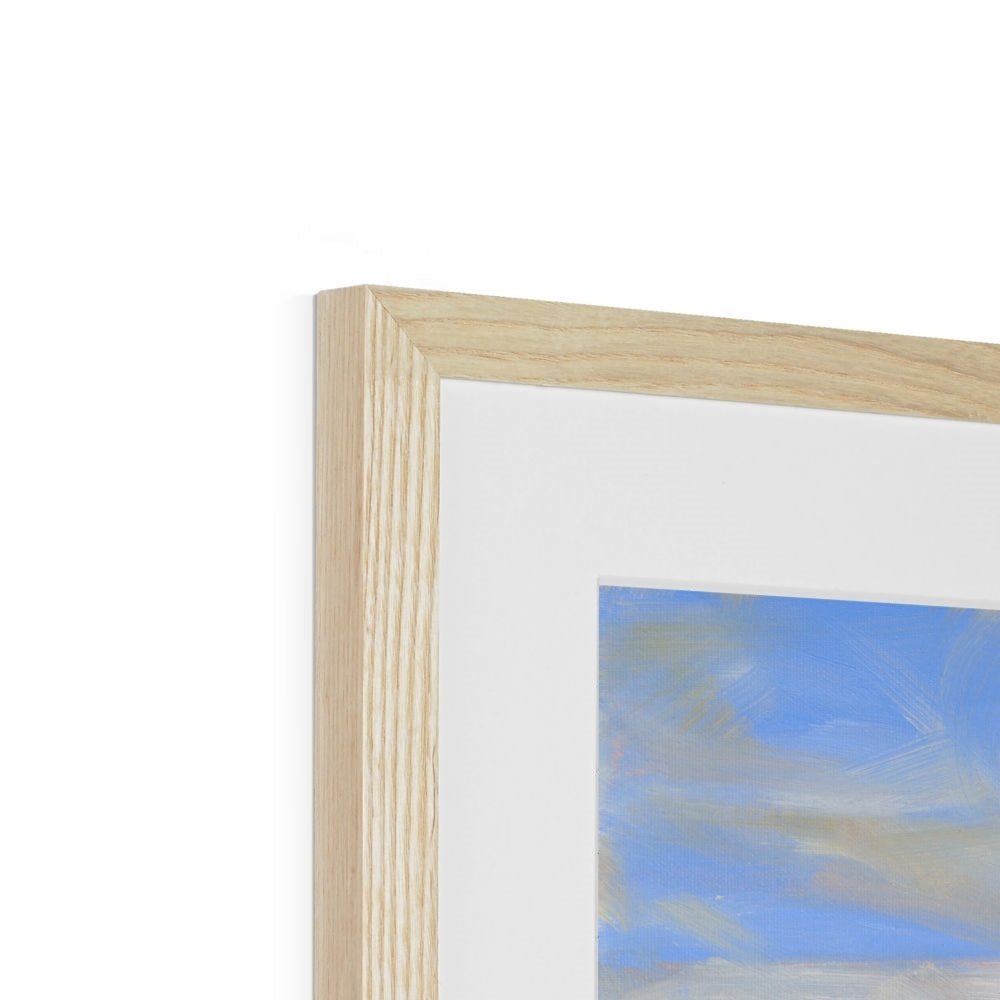 Close-up of a wooden picture frame with a blurred artwork inside on a white background