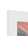 Close-up of a white frame with an abstract painting inside on a white background